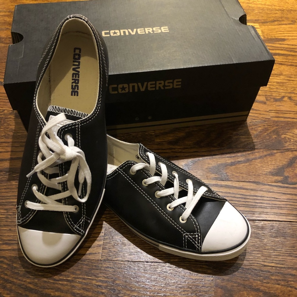 Black and white leather Converse sneakers